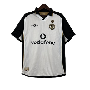 Camisa Dupla Face Retrô Manchester United Umbro 2001/02 100 Anos Masculina Branca e Preta ou Dourada