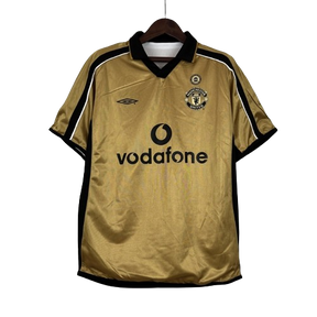 Camisa Dupla Face Retrô Manchester United Umbro 2001/02 100 Anos Masculina Branca e Preta ou Dourada